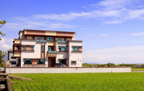 Отель Home of 120 B&B  Jiaosi